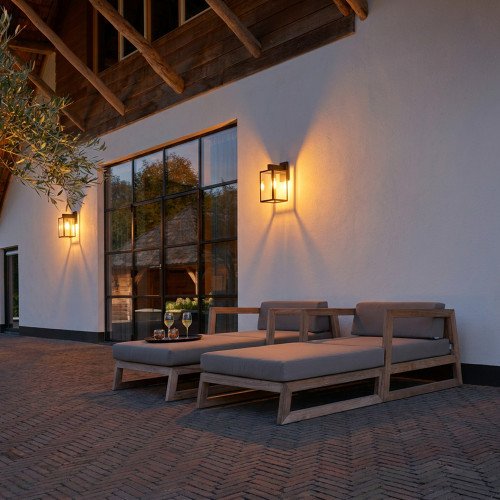 hampton buitenlamp wandlamp met heldere beglazing in matzwarte kleur uitgerust met led lichtbron met schemersensor