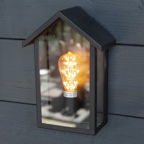 Zwarte buitenlamp, home design, vlakke achterzijde, wandlamp voor buiten met zwart frame en heldere beglazing, vorm van een huis